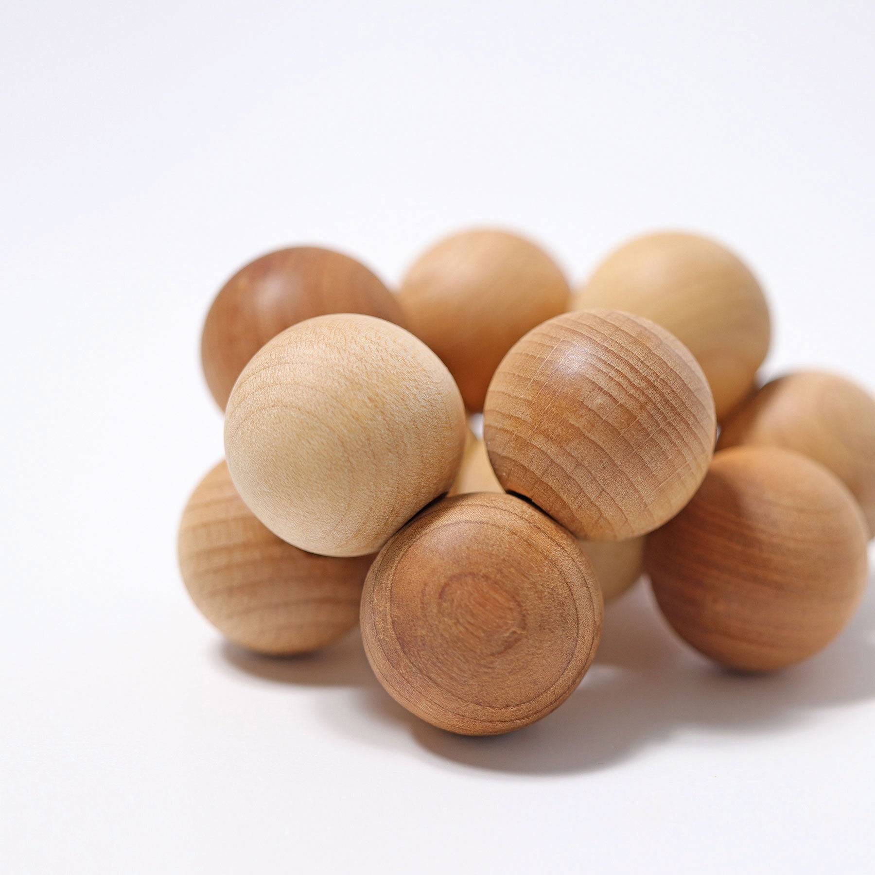 Grijpspeeltje naturelkralen
